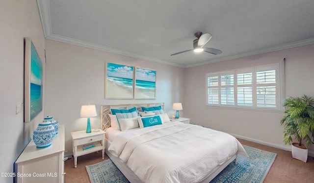 bedroom with ceiling fan, carpet floors, and ornamental molding