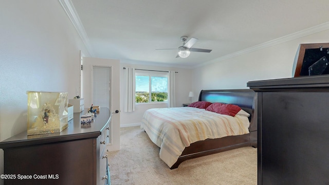 bedroom featuring ceiling fan, light colored carpet, and ornamental molding