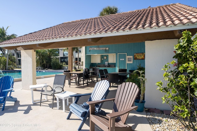 view of patio / terrace with a community pool