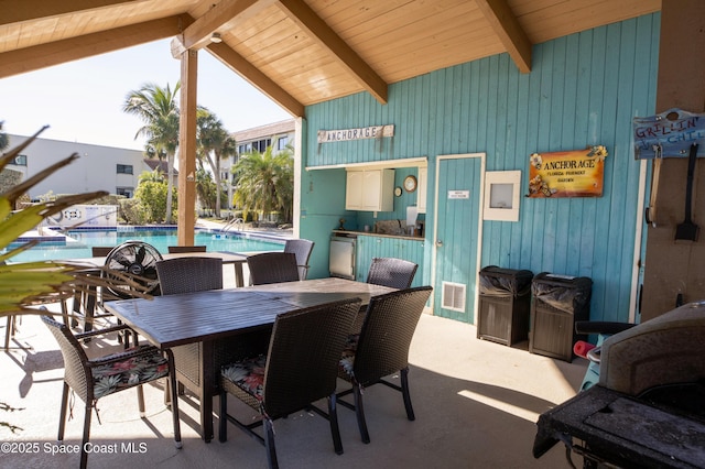 view of patio featuring a community pool