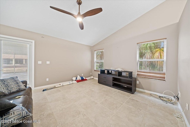 miscellaneous room with ceiling fan, vaulted ceiling, and plenty of natural light