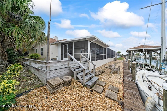 exterior space with a water view