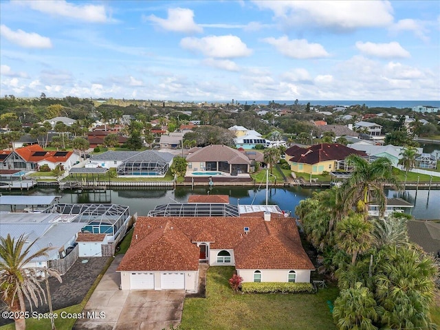 aerial view featuring a water view