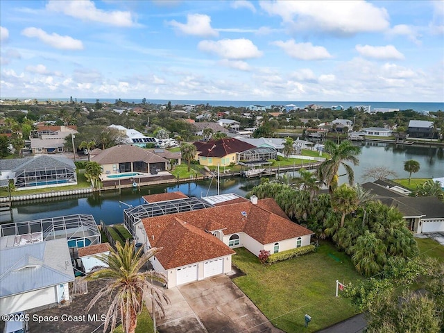 drone / aerial view featuring a water view