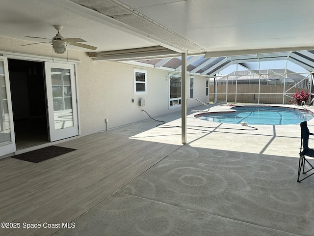view of pool featuring fence, ceiling fan, a fenced in pool, and a patio