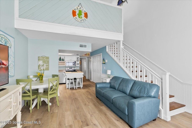 living room with light hardwood / wood-style floors