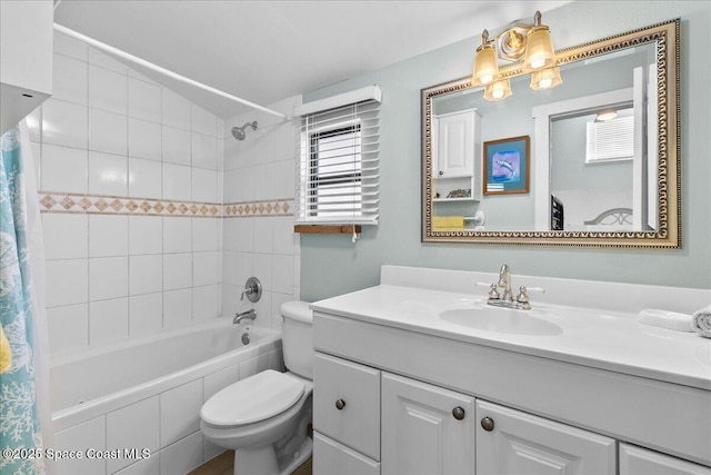 full bathroom with shower / bath combination with curtain, vanity, and toilet