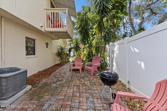 view of patio featuring cooling unit