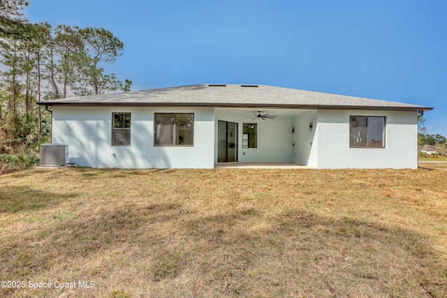 back of house featuring a patio, cooling unit, ceiling fan, and a lawn