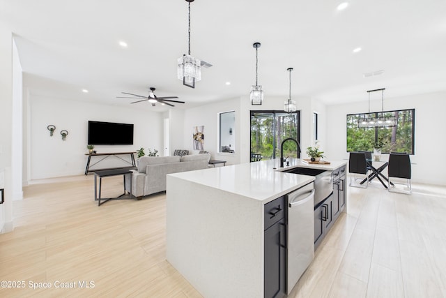 2311 San Filippo Dr SE, Palm Bay, FL 32909 - kitchen featuring light countertops, a sink, dishwasher, visible vents, and recessed lighting