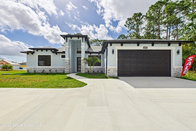 2311 San Filippo Dr SE, Palm Bay, FL 32909 - view of front of house with stone siding, a garage, concrete driveway, a front lawn, and stucco siding