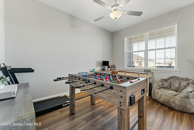 rec room featuring ceiling fan and dark hardwood / wood-style flooring