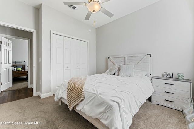 bedroom with a closet, ceiling fan, and carpet