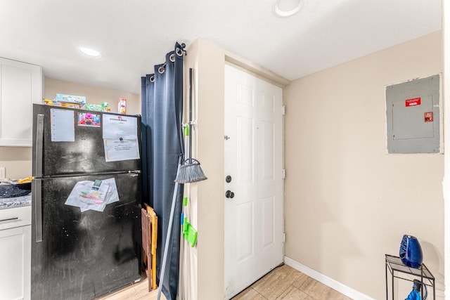 utility room featuring electric panel