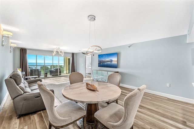 dining room featuring light hardwood / wood-style floors