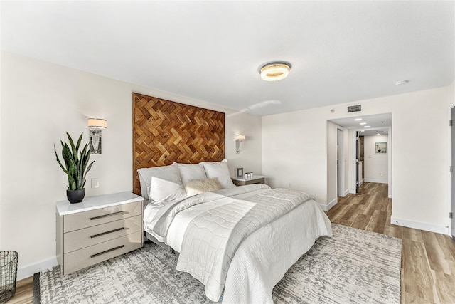 bedroom featuring light wood-type flooring