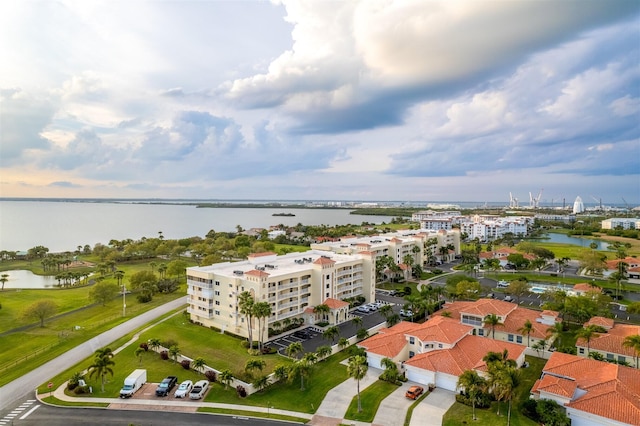 birds eye view of property with a water view