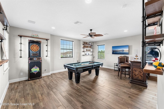 playroom with ceiling fan, a textured ceiling, dark hardwood / wood-style floors, and billiards