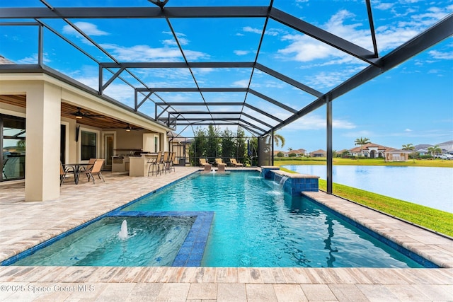 view of swimming pool featuring glass enclosure, a water view, an outdoor bar, and pool water feature