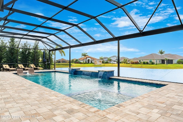 view of swimming pool featuring a patio, glass enclosure, and pool water feature