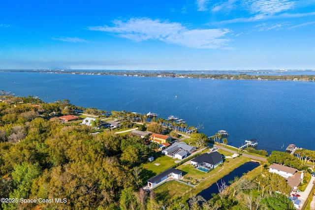 drone / aerial view with a water view