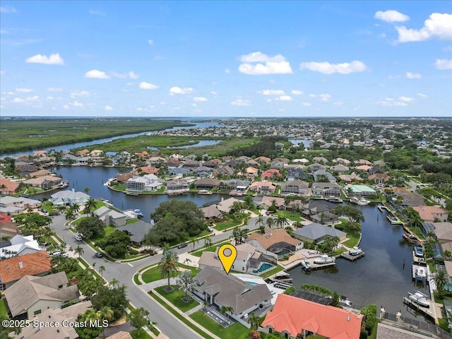 drone / aerial view with a water view