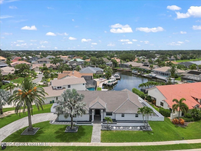 drone / aerial view featuring a water view