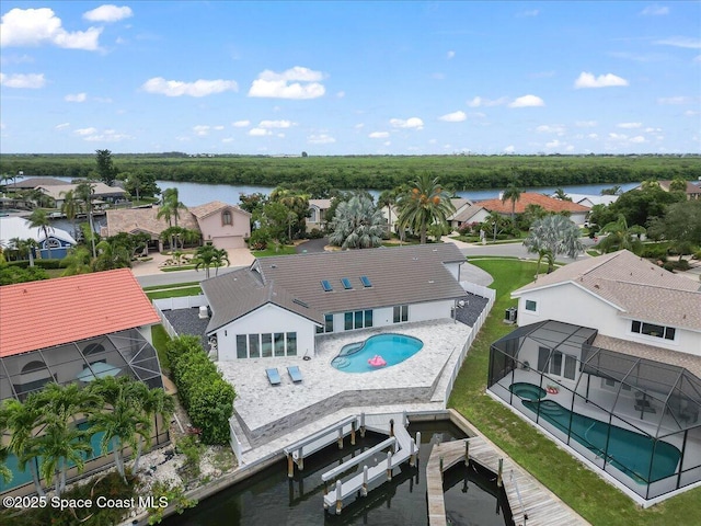 drone / aerial view featuring a water view