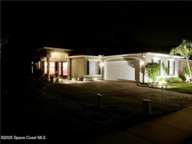 view of front of home featuring a garage