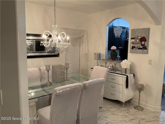 dining room featuring an inviting chandelier