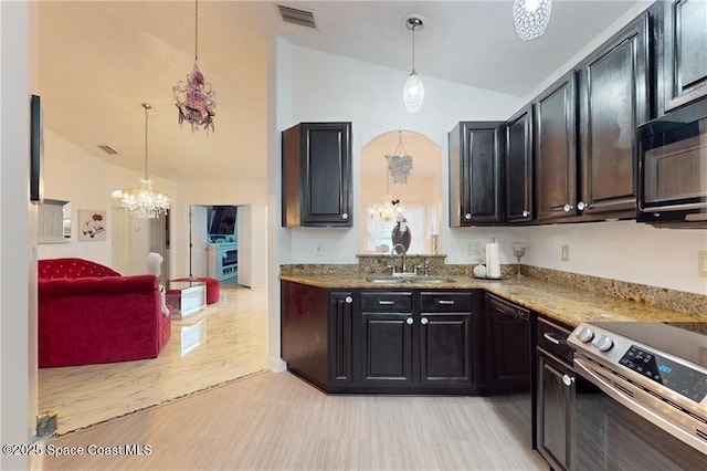 kitchen with vaulted ceiling, stainless steel electric range, pendant lighting, and black microwave