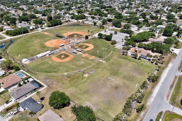 birds eye view of property with a residential view