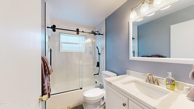 full bathroom with toilet, bath / shower combo with glass door, and vanity