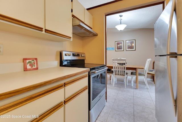 kitchen with decorative light fixtures, white cabinetry, light tile patterned floors, and stainless steel appliances