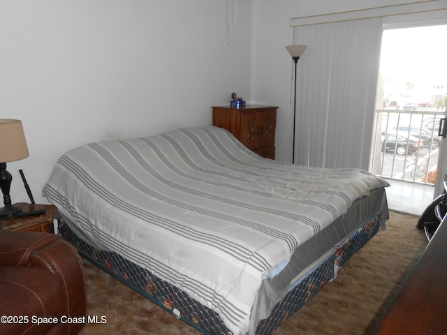 bedroom featuring carpet