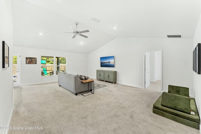 carpeted living room featuring lofted ceiling and ceiling fan