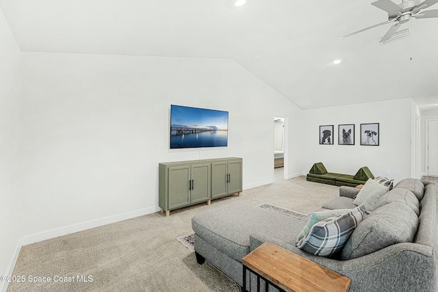 living room with ceiling fan, lofted ceiling, and light carpet