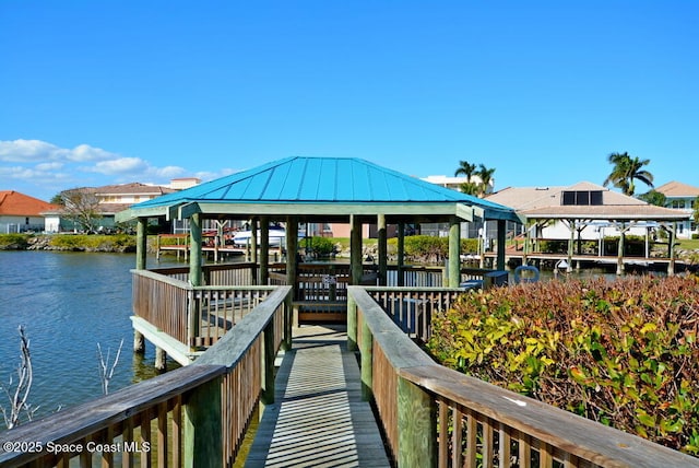 300 Columbia Dr Unit 5051, Cape Canaveral, FL 32920 - view of dock featuring a gazebo and a water view