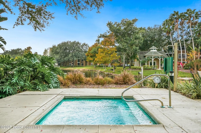 view of pool featuring a gazebo and a patio