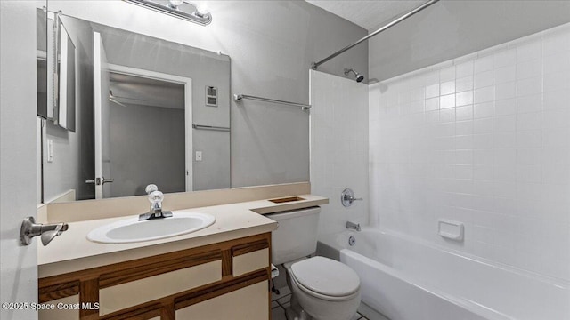 full bathroom with toilet, ceiling fan, shower / bathtub combination, and vanity