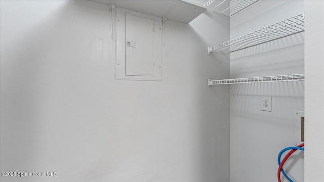 walk in closet featuring electric panel