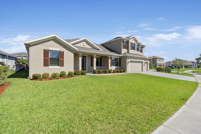 view of front of property with a garage and a front lawn