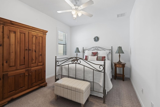 bedroom with ceiling fan and carpet