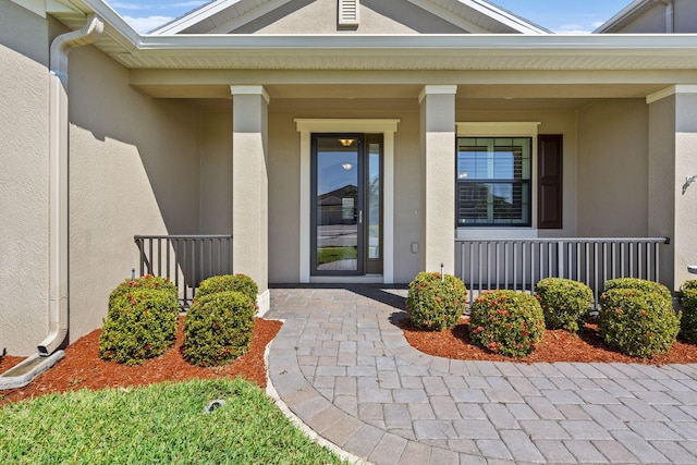 entrance to property with covered porch