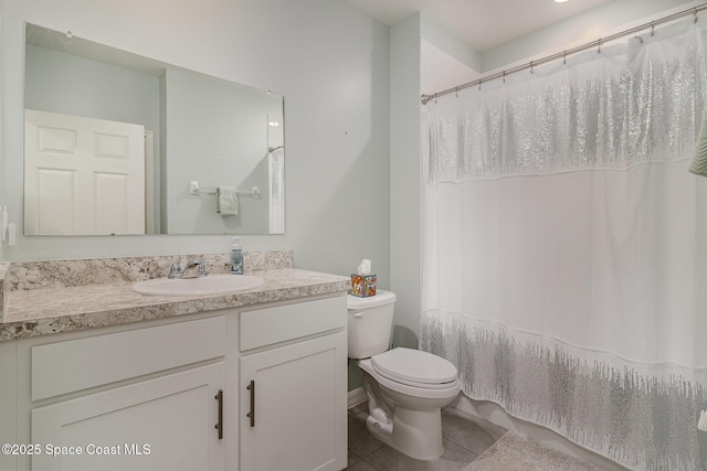 bathroom with tile patterned floors, vanity, toilet, and a shower with shower curtain