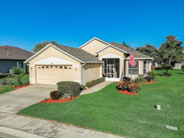 ranch-style house featuring a front yard and a garage