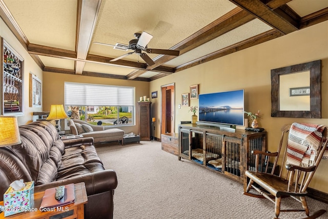 carpeted living room featuring coffered ceiling, ceiling fan, and beamed ceiling