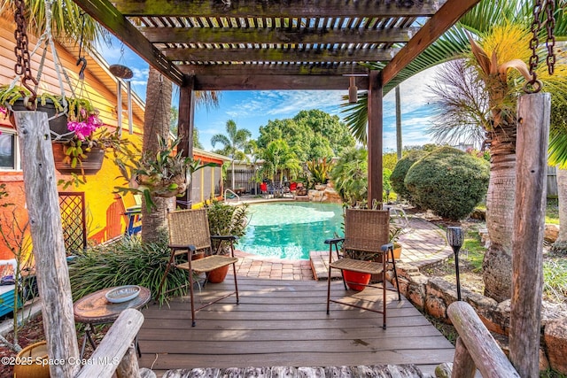 wooden deck featuring a pergola