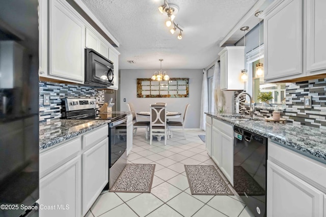 kitchen with a notable chandelier, black appliances, sink, a textured ceiling, and white cabinets