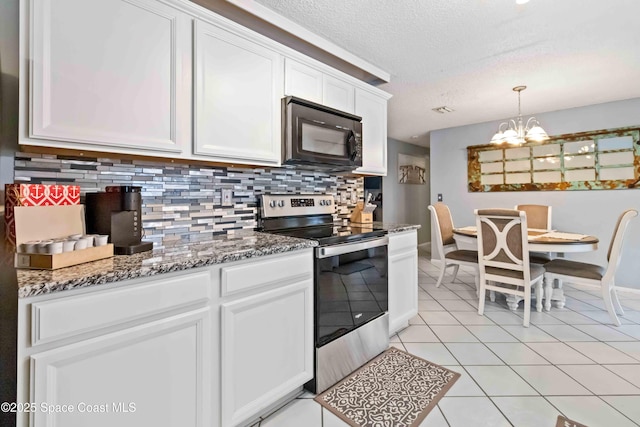 kitchen with stainless steel range with electric cooktop, an inviting chandelier, white cabinets, and tasteful backsplash